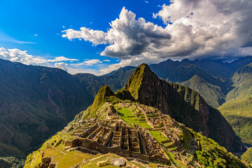 Peru, Eastern Cordillera, Cusco region. Historic Sanctuary of Machu Picchu seen from House of Guards. There is Huayna Picchu raised above the Inca city