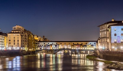 Fototapeta na wymiar Florence - View of the old bridge with plays of light and colors