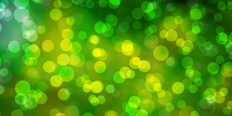 Light Green, Yellow vector background with spots. Colorful illustration with gradient dots in nature style. Pattern for wallpapers, curtains.