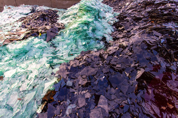 Image of waste glass for recycling in industry,broken glass recycled.