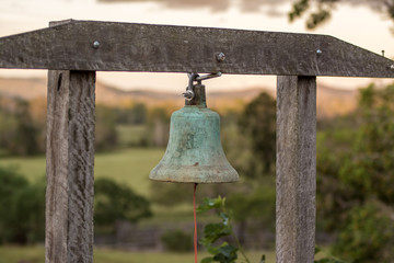 Fototapeta premium old wooden bell on stand 
