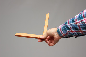 right angle in the hand of an adult