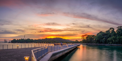 Fototapeta na wymiar Sunset at Keppel island overlooking to Bukit Chermin Boardwalk, Singapore