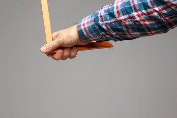 right angle in the hand of an adult