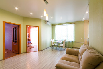 Home Interior With Open Plan Kitchen, Lounge And Dining Area