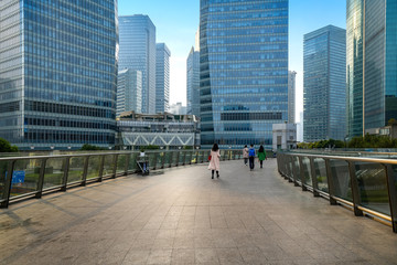 Fototapeta na wymiar Empty square and skyscraper in Shanghai financial center, China