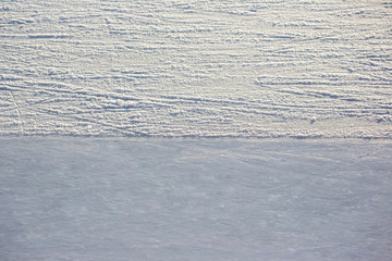 the difference between brushed ice for ice skating and used ice. service for cleaning ice. texture and background