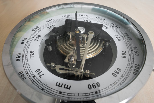 Analog barometer in classical style for measuring air pressure