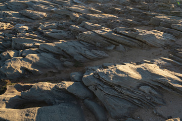 Details on sand rocks at Praia do Malhao beach, in Portugal