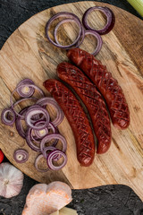 roasted sausages with garlic and onion