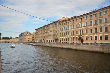 Fototapeta na wymiar Lake View in st petersburg in russia and buildings on the river side and ships in the river 