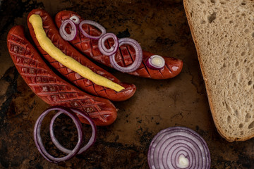 roasted sausages with mustard and onion