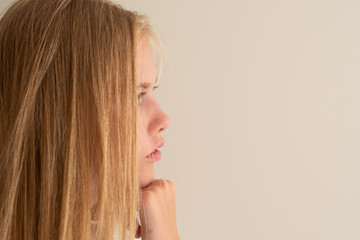 Side view of young teenager girls deep in thoughts. Thinking concept