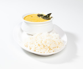 Indian Traditional Cuisine Kadhi Chawal Also Know as Curry Chawal, Yogurt Curry with Rice on White Background