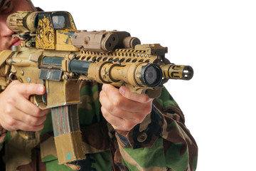 man with airsoft wear and air rifle