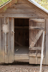 Fototapeta na wymiar Weathered wooden building door
