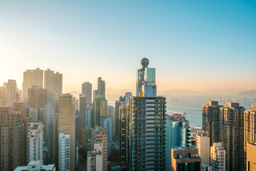 Fototapeta na wymiar Hong Kong city skyline , skyscraper and blue sky copy space -