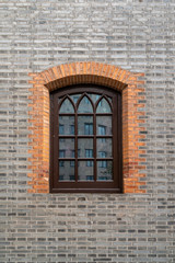 Gothic windows and brick walls