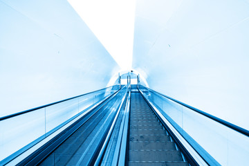 Fototapeta na wymiar modern escalator in shopping center