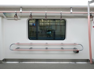 The empty interior of the subway car