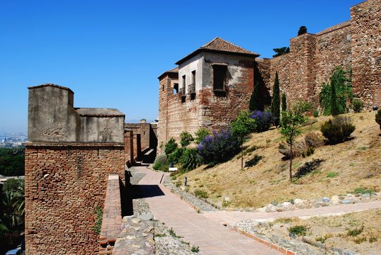 Upper walled precinct of the citadel viewed from the South at Malaga castle, Malaga, Spain.
