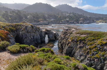 natural arch at Pelican Point in Point Lobos State Natural Reserve (Carmel-By-The-Sea, California,...
