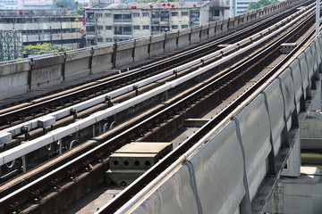 Fototapeta premium Rails of electric train in city, Detail of railway construction