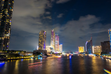 Fototapeta premium City view by the river Bright night The beauty of the capital