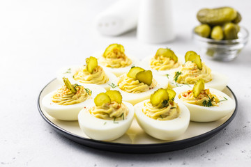 Dill pickle deviled eggs. Selective focus, space for text.