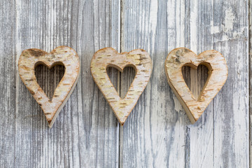 Heart shape on wooden background