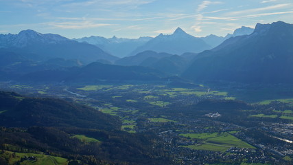 Fototapeta na wymiar Aerial panoramic view of Salzburg and Alpine mountains from the top of Untersberg mountain in Austria.