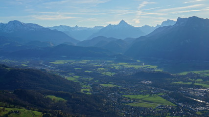 Aerial panorama of Salzburg and Alps from the top of Untersberg mountain in Austria.