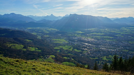 Aerial panorama of Salzburg and Alps from the top of Untersberg mountain in Austria.