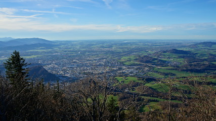 Fototapeta premium Aerial panorama of Salzburg from the top of Untersberg mountain in Austria.