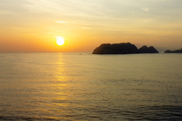 Muscat coast, mountain rock, sunset sea view, Oman