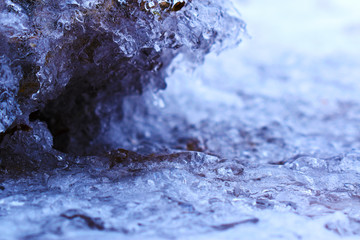 ice on a stone close-up, cave