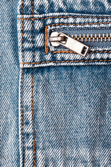 Blue jeans pocket. Metal denim zipper.