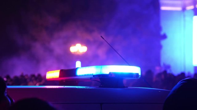 red blue lights flashing in police vehicle
