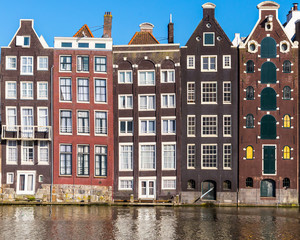 Amsterdam Damrak Leaning Canal Houses © Nigel Wiggins