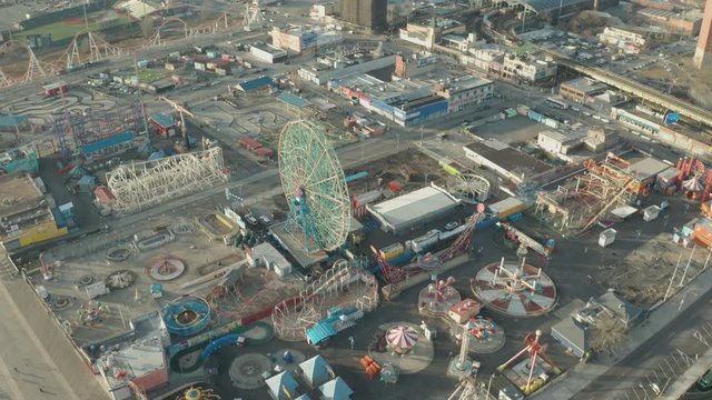 Aerial Descending Drone Shot of Coney Island Ferris Wheel and Amusement Park