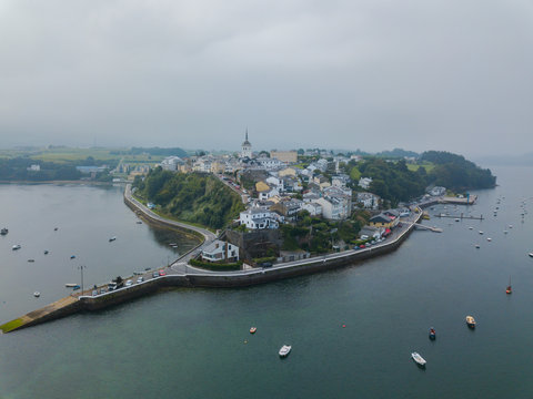 Aerial view of the city of Castropol and the bay during fog. Northern Spain in summer