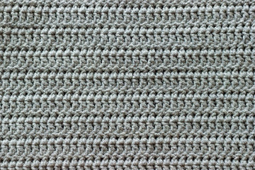 Gray crochet knit texture closeup