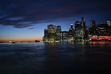 Naklejka na ściany i meble New york skyline sunset
