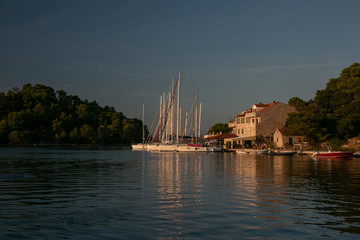 picturesque port of Pomena with sailboats and cozy restaurants on Mljet Island, Croatia