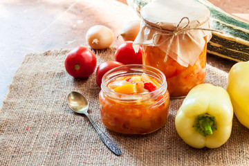 Homemade preserving. Zucchini and bell pepper salad in glass jar