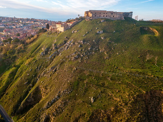 Aerial view of the Norman Swabian castle, Vibo Valentia, Calabria, Italy. Overview of the city seen from the sky, houses and rooftops