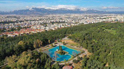 Aerial drone photo of famous park of Filadelfia or Philadelfia in a winter morning in the heart of Athens near Parnitha mountain, Attica, Greece