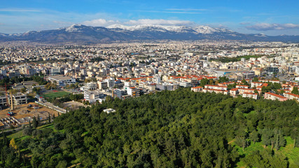 Fototapeta premium Aerial drone photo of famous park of Filadelfia or Philadelfia in a winter morning in the heart of Athens near Parnitha mountain, Attica, Greece