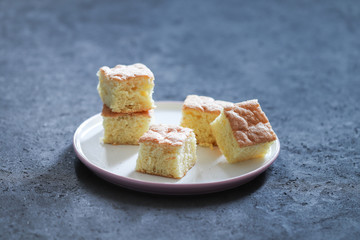Dessert cake, semolina sponge cake, cut into small pieces
