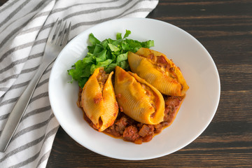 Cheeseburger Stuffed Shells with Shredded Lettuce